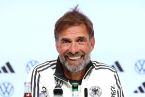 Klopp plays down prospect of Liverpool being handed Man City titles